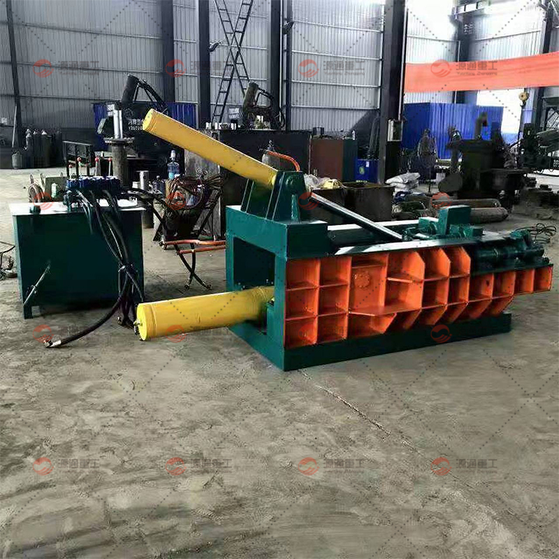 Metal briquetting machine